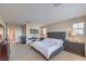 Comfortable bedroom features a tufted headboard, neutral tones, and ample space at 3778 Via Gennaro, Henderson, NV 89044