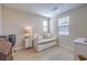 Bedroom features a daybed, desk, and natural light at 3778 Via Gennaro, Henderson, NV 89044