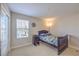 Cozy bedroom featuring a single bed, window with blinds, and closet at 3778 Via Gennaro, Henderson, NV 89044