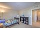 Comfortable bedroom featuring bed, bookcase, and a neutral color palette at 3778 Via Gennaro, Henderson, NV 89044