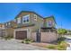 Two-story home with a large garage and well-maintained landscaping in a residential area at 3778 Via Gennaro, Henderson, NV 89044
