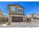 Charming two-story home featuring a brown garage door and well-maintained front yard in a suburban neighborhood at 3778 Via Gennaro, Henderson, NV 89044