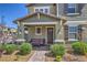 Inviting home exterior featuring a cozy front porch and manicured landscaping at 3778 Via Gennaro, Henderson, NV 89044