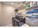 Functional laundry room equipped with modern washer and dryer units and plenty of storage space at 3778 Via Gennaro, Henderson, NV 89044