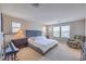 Spacious main bedroom features many windows for natural light and an ensuite bathroom at 3778 Via Gennaro, Henderson, NV 89044