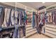 Organized walk-in closet featuring ample shelving and hanging storage at 3778 Via Gennaro, Henderson, NV 89044