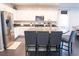 Spacious kitchen with stainless steel appliances, ample counter space and seating at the island at 4178 Eagle Island St, Las Vegas, NV 89130