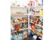 A well stocked walk-in pantry features wrap around shelving at 4178 Eagle Island St, Las Vegas, NV 89130