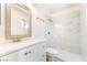 Bathroom featuring vanity and shower with modern tile surround at 4274 Rollingstone Dr, Las Vegas, NV 89103