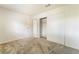 This carpeted bedroom features closet with sliding doors and entryways at 4274 Rollingstone Dr, Las Vegas, NV 89103