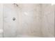 Nicely tiled walk-in shower with white marble pattern tile at 4274 Rollingstone Dr, Las Vegas, NV 89103