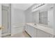 The bathroom features a bathtub, shower, and vanity with modern fixtures at 4400 W Lake Mead Blvd # 101, Las Vegas, NV 89108