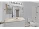 The well-lit bathroom has a single vanity, a full mirror, and a shower-tub combination at 4400 W Lake Mead Blvd # 101, Las Vegas, NV 89108