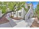 The exterior of this home includes a walkway, stairs to the upper level, and mature landscaping at 4400 W Lake Mead Blvd # 101, Las Vegas, NV 89108