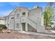 Charming two-story condo featuring stucco exterior and desert landscaping at 4400 W Lake Mead Blvd # 101, Las Vegas, NV 89108