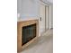 Close-up on the fireplace and sliding glass door to the balcony at 4400 W Lake Mead Blvd # 101, Las Vegas, NV 89108