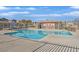 Inviting community pool area with ample seating, perfect for residents to relax and socialize at 5717 Heineken Dr, North Las Vegas, NV 89031