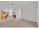 Open-concept living area with a kitchen and dining space, perfect for entertaining at 5717 Heineken Dr, North Las Vegas, NV 89031