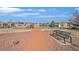 Community playground featuring various play structures and a bench, offering recreational opportunities for families at 5717 Heineken Dr, North Las Vegas, NV 89031