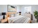 Serene bedroom with a neutral palette, stylish decor, and ample natural light at 6170 W University Ave, Las Vegas, NV 89103