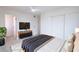 Bedroom with light walls, carpet, closet, doorway and ceiling fan at 6170 W University Ave, Las Vegas, NV 89103
