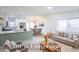 Bright and airy living room featuring an open floor plan and modern furnishings at 6170 W University Ave, Las Vegas, NV 89103
