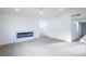 Bright living room features recessed lighting, a modern fireplace, and neutral walls at 6170 W University Ave, Las Vegas, NV 89103