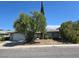 Charming single-story home with mature landscaping and a two-car garage in a quiet neighborhood at 6284 Explorer Dr, Las Vegas, NV 89103