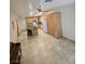 Large kitchen with a granite island, tile floors, and ample cabinet space at 6284 Explorer Dr, Las Vegas, NV 89103