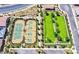 Aerial view of tennis courts and recreational area showcasing community amenities at 704 Webber Park St, Henderson, NV 89011