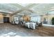 A spacious ballroom features elegant lighting, large windows, and ample space at 704 Webber Park St, Henderson, NV 89011