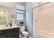 Cozy bathroom features a shower and bathtub combination, a toilet and sink at 704 Webber Park St, Henderson, NV 89011