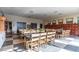 A clubhouse dining area boasts tables, chairs and numerous lockers for storage at 704 Webber Park St, Henderson, NV 89011