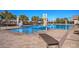 Resort-style community pool with ample seating and shade for relaxation and recreation at 704 Webber Park St, Henderson, NV 89011