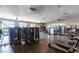 Well-equipped fitness center with cardio machines, weight stations, and mirrored walls at 704 Webber Park St, Henderson, NV 89011