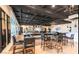 A comfortable lounge area with tables, chairs, and a relaxed atmosphere at 704 Webber Park St, Henderson, NV 89011