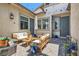 Cozy outdoor patio with comfortable seating, string lights, and stylish decor, perfect for relaxing or entertaining guests at 704 Webber Park St, Henderson, NV 89011