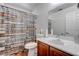 Bathroom featuring a shower with motivational shower curtain and essential toiletries at 7120 Bear Paw Creek St # 101, Las Vegas, NV 89149