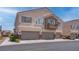 Charming two-story townhouse with a private balcony and attached two-car garage at 7120 Bear Paw Creek St # 101, Las Vegas, NV 89149