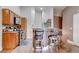 Open kitchen with stainless steel appliances and bar seating at 7120 Bear Paw Creek St # 101, Las Vegas, NV 89149