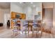 Charming kitchen with barstool seating, modern microwave and sink, and plenty of countertop space at 7120 Bear Paw Creek St # 101, Las Vegas, NV 89149
