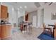 Bright and spacious kitchen featuring modern appliances, a breakfast bar, and an open layout at 7120 Bear Paw Creek St # 101, Las Vegas, NV 89149