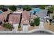 Aerial view of the home featuring a well-manicured front yard and a two car garage at 7137 Eyebright St, Las Vegas, NV 89131