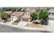 Aerial view of a well-maintained home in a neighborhood with mature trees and easy access to nearby amenities at 7137 Eyebright St, Las Vegas, NV 89131