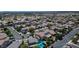 Aerial shot of the neighborhood showing the house featuring a well-maintained yard and pool at 7137 Eyebright St, Las Vegas, NV 89131