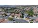 Attractive aerial shot of a residential neighborhood showcasing well-maintained homes and tree-lined streets at 7137 Eyebright St, Las Vegas, NV 89131