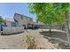 Backyard featuring a partial above ground pool, desert landscaping, hammock, and gazebo; perfect for outdoor living at 7137 Eyebright St, Las Vegas, NV 89131