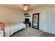 Bedroom with carpet features natural light, a modern fan, and closet storage at 7137 Eyebright St, Las Vegas, NV 89131