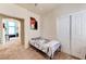 This bedroom includes closet, with a view into the other room, and neutral colors, maximizing space at 7137 Eyebright St, Las Vegas, NV 89131