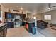 Functional kitchen with dark wood cabinets, stainless steel appliances, and tile backsplash at 7137 Eyebright St, Las Vegas, NV 89131